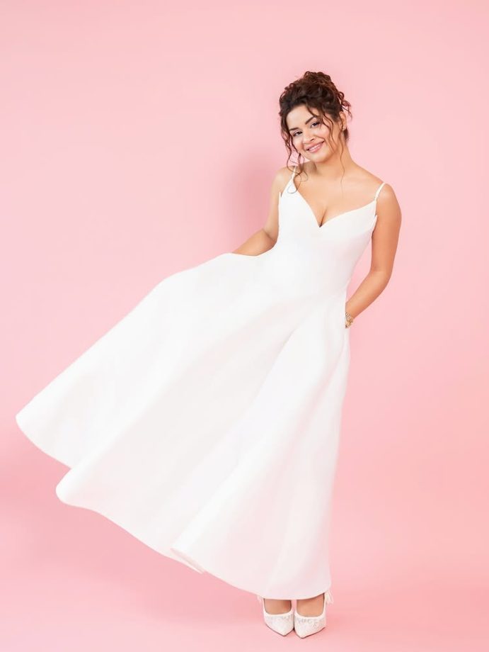 Avneet Kaur Dazzles in a Dreamy White Dress with Playful Charm 964344