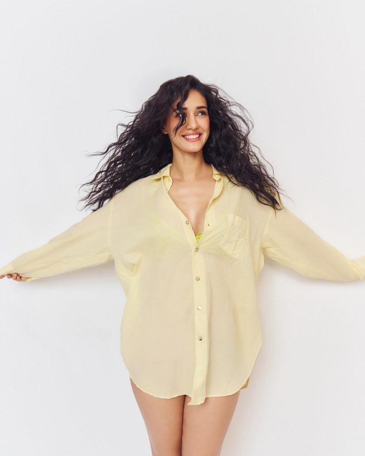 Disha Patani's Sultry Style in Yellow Unbutton Shirt Look 962788