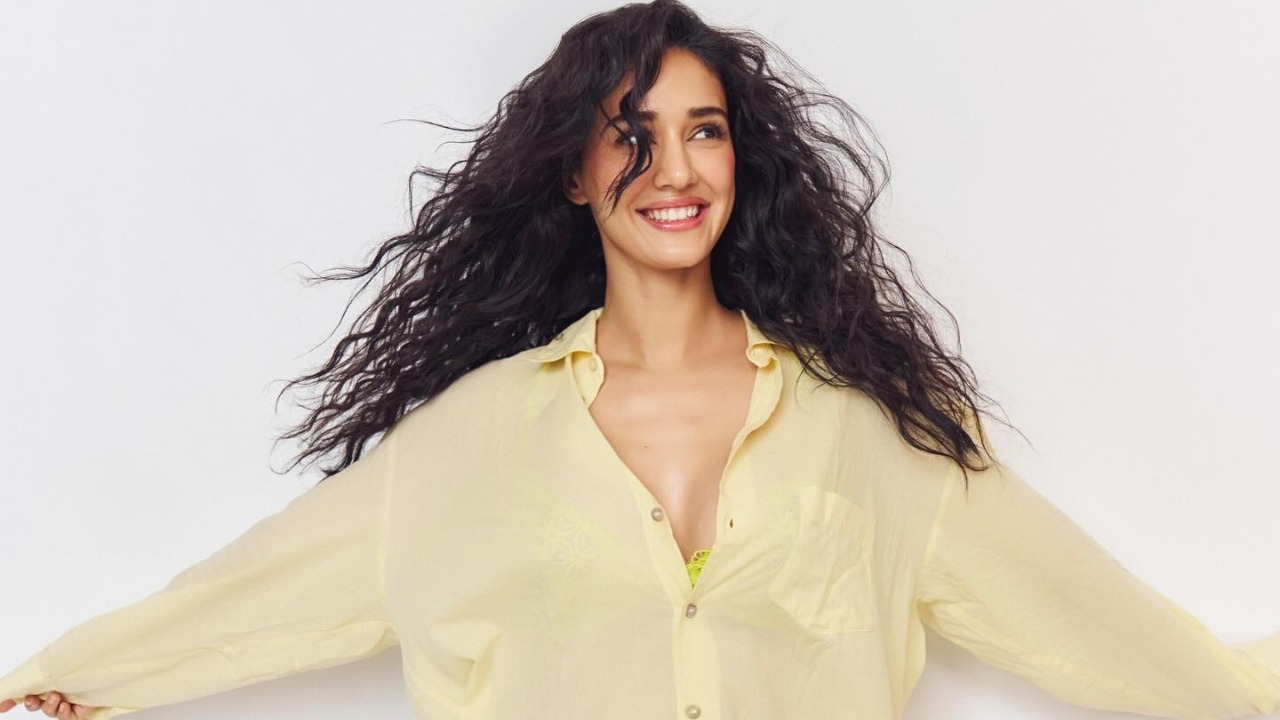Disha Patani's Sultry Style in Yellow Unbutton Shirt Look 962789