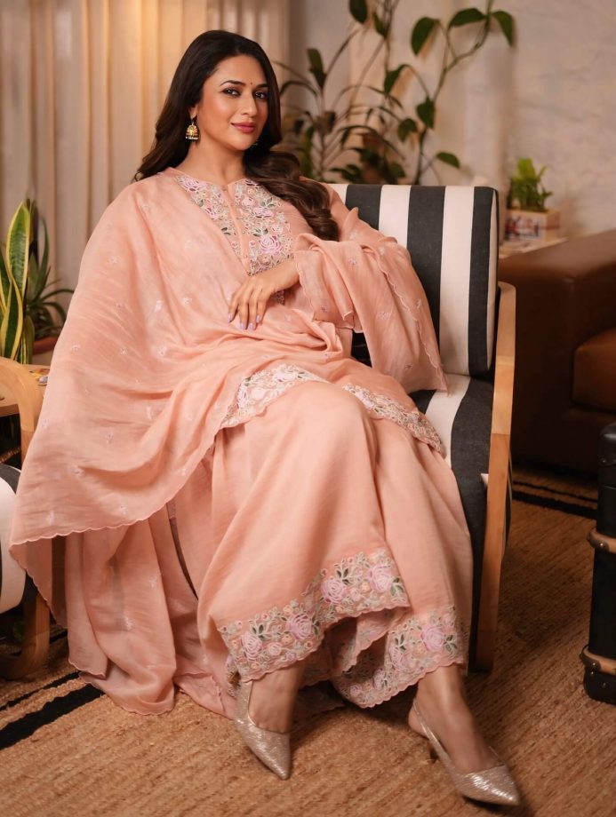 Divyanka Tripathi Shines in Pastel Peach, Dismisses Bigg Boss Rumors 964005