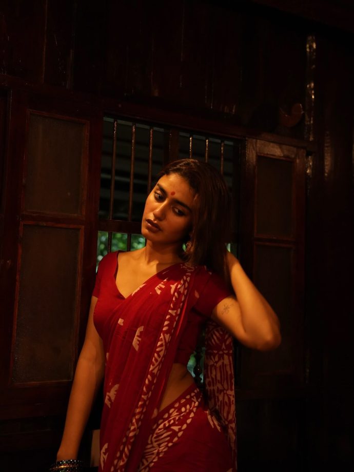 Priya Prakash Varrier Embraces Winter Vibes in Traditional Red Saree 962981