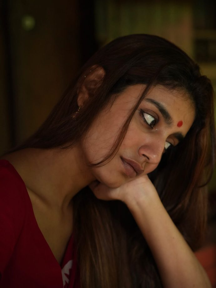 Priya Prakash Varrier Embraces Winter Vibes in Traditional Red Saree 962983