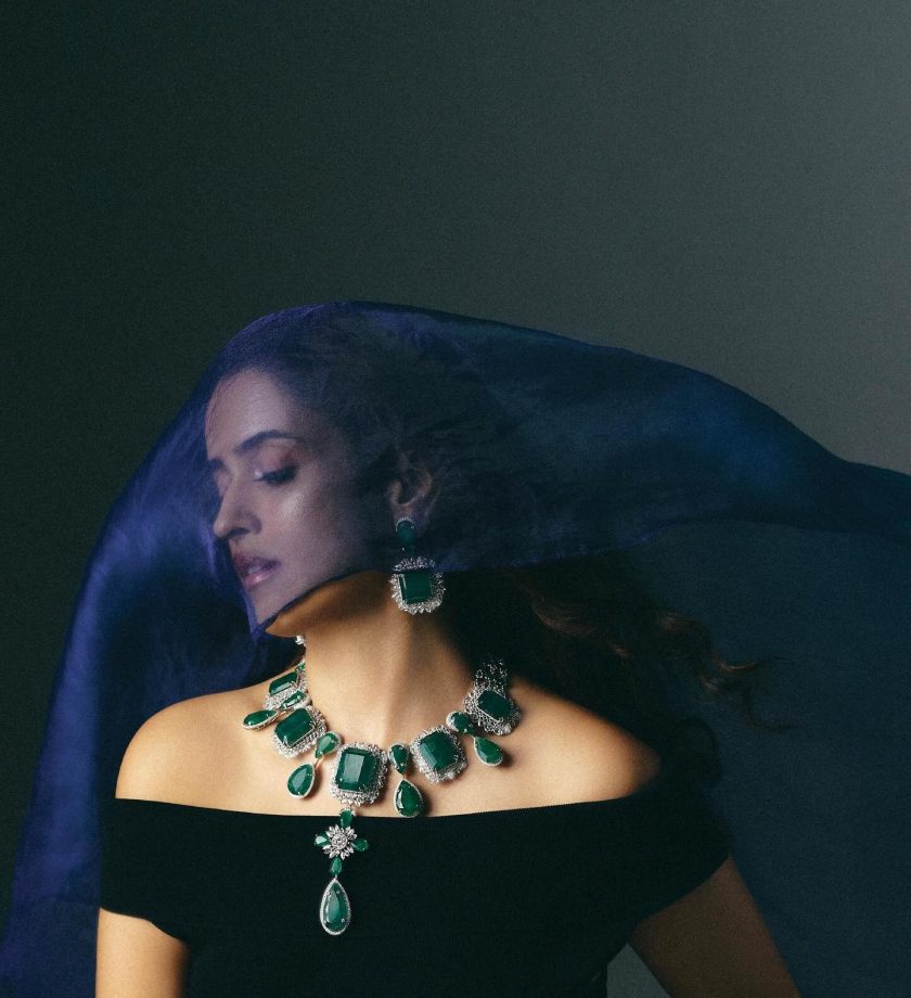 Sanya Malhotra Channels Glam Goth in Off-Shoulder Black Dress with Emerald Accents 960545