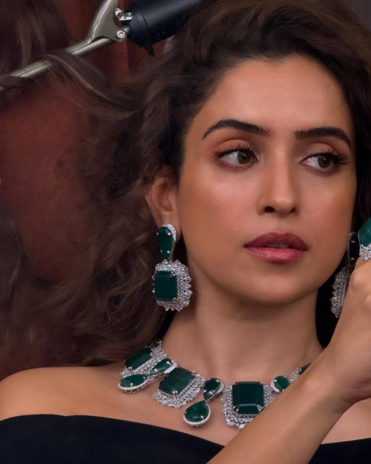 Sanya Malhotra Channels Glam Goth in Off-Shoulder Black Dress with Emerald Accents 960546
