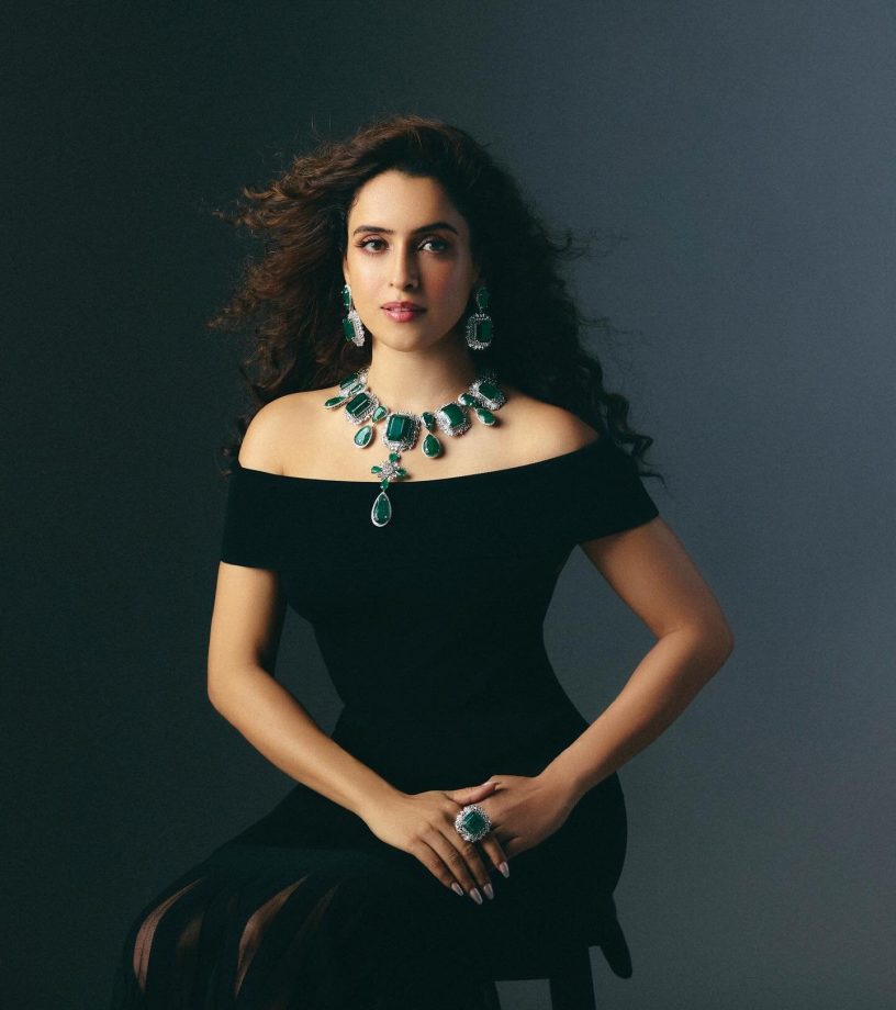 Sanya Malhotra Channels Glam Goth in Off-Shoulder Black Dress with Emerald Accents 960543