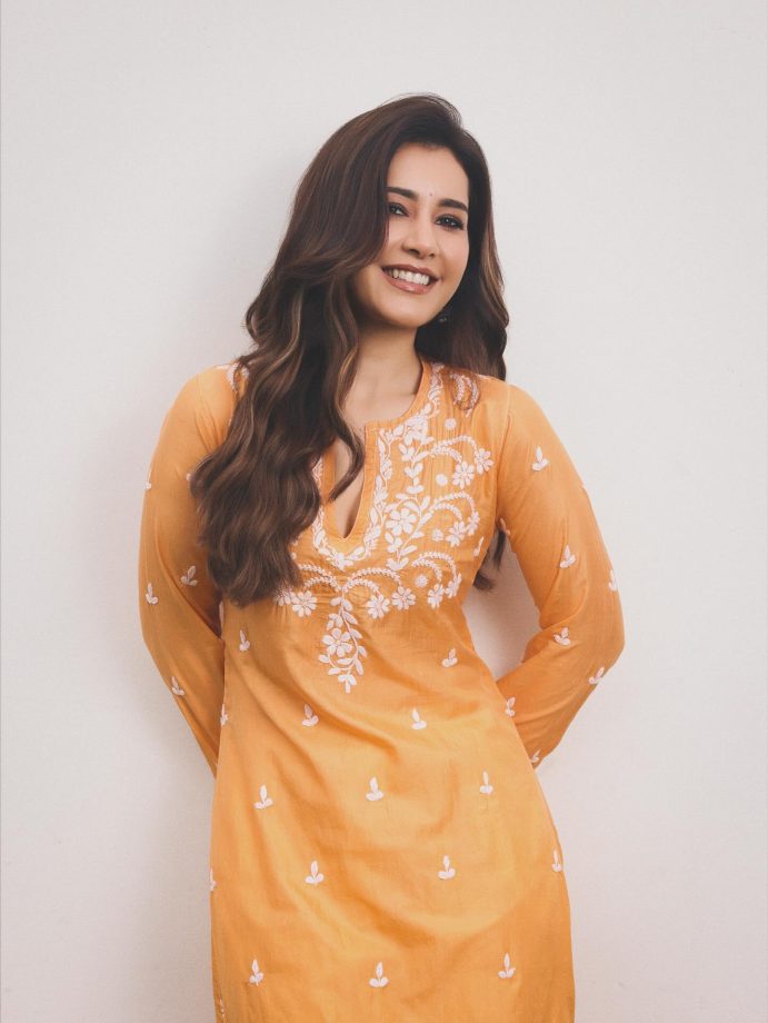 Raashii Khanna Radiates Elegance in Bright Orange Kurta as She Begins Telusu kada Promotions 969208
