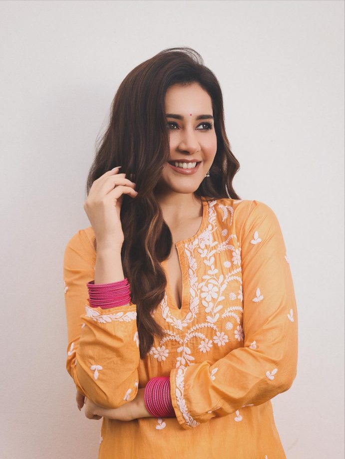 Raashii Khanna Radiates Elegance in Bright Orange Kurta as She Begins Telusu kada Promotions 969209