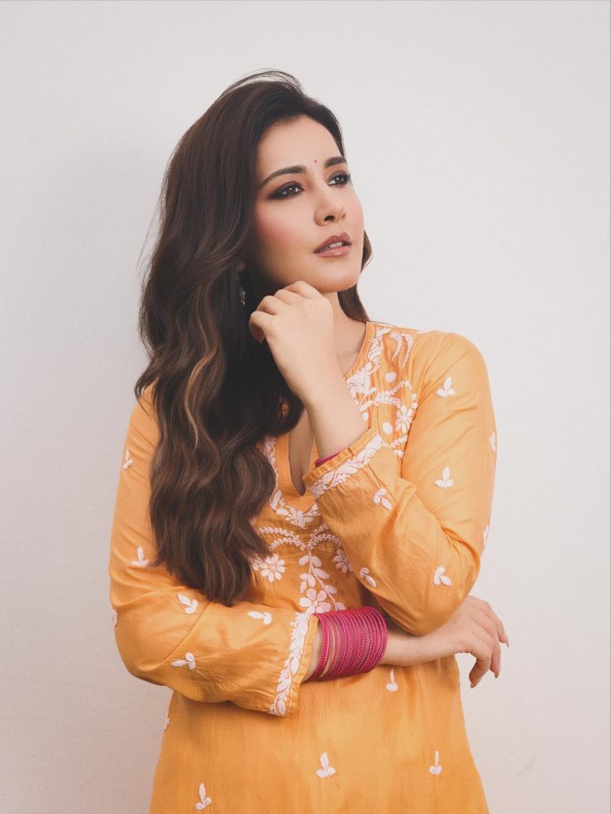 Raashii Khanna Radiates Elegance in Bright Orange Kurta as She Begins Telusu kada Promotions 969206