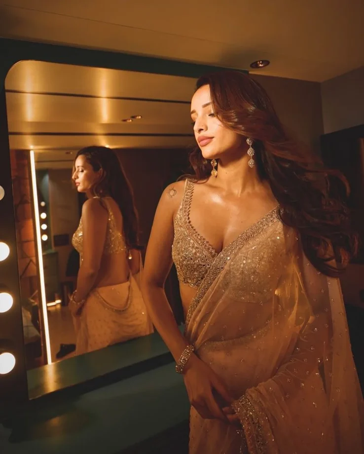 Tripti Dimri's Glimpse of Glamour in a Beige Saree 967976