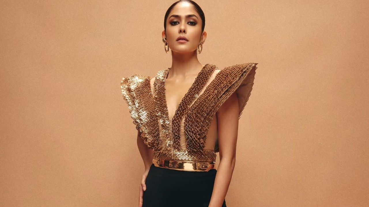 Mrunal Thakur Shines in Golden Glam with a Touch of Black 973710