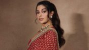 Jacqueline Fernandez Radiates Classic Bridal Charm in Timeless Red Benarasi Saree