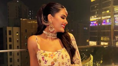 Priyanka Chahar Choudhary Glows in a Floral Saree Under the City Lights