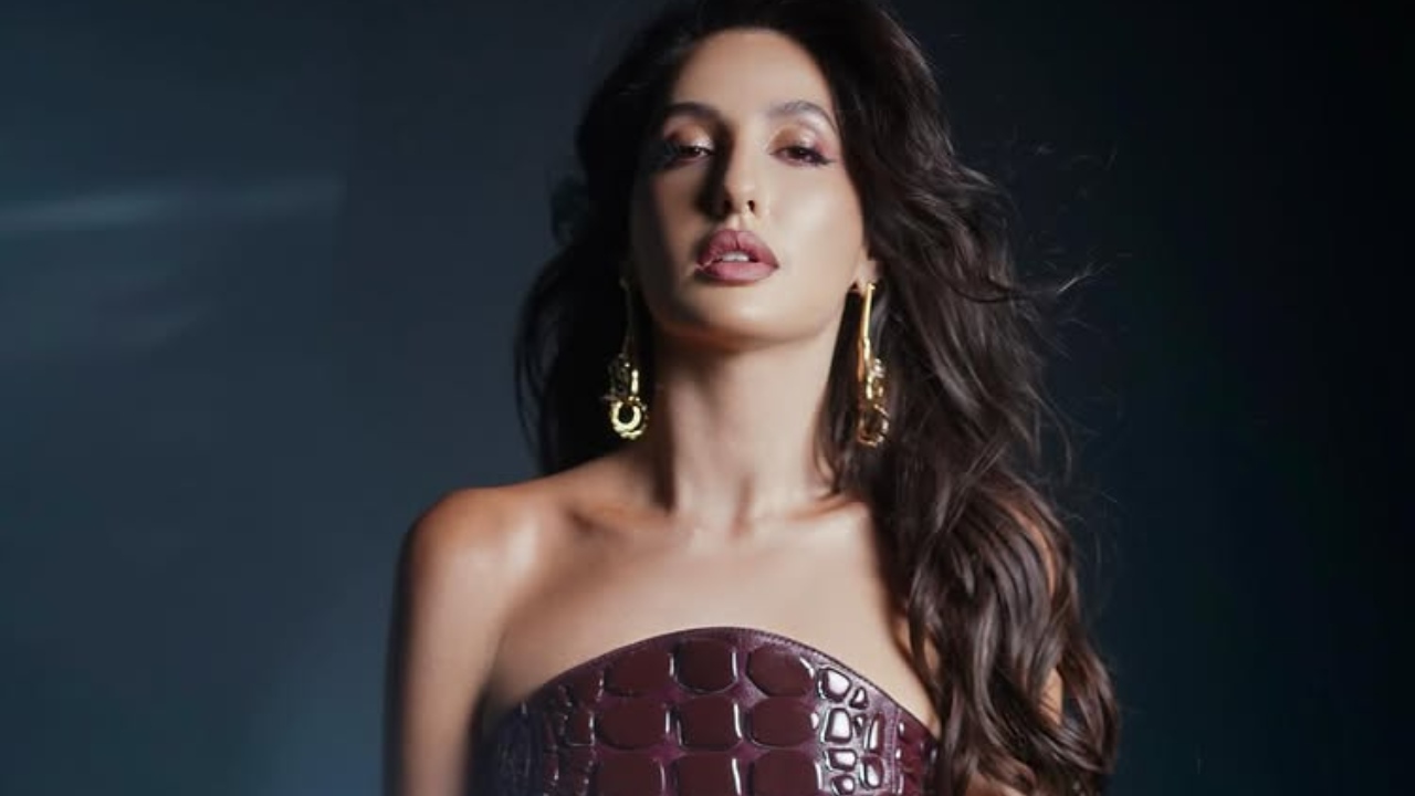 Nora Fatehi Makes a Bold Style Statement in a Deep Wine Mini Dress
