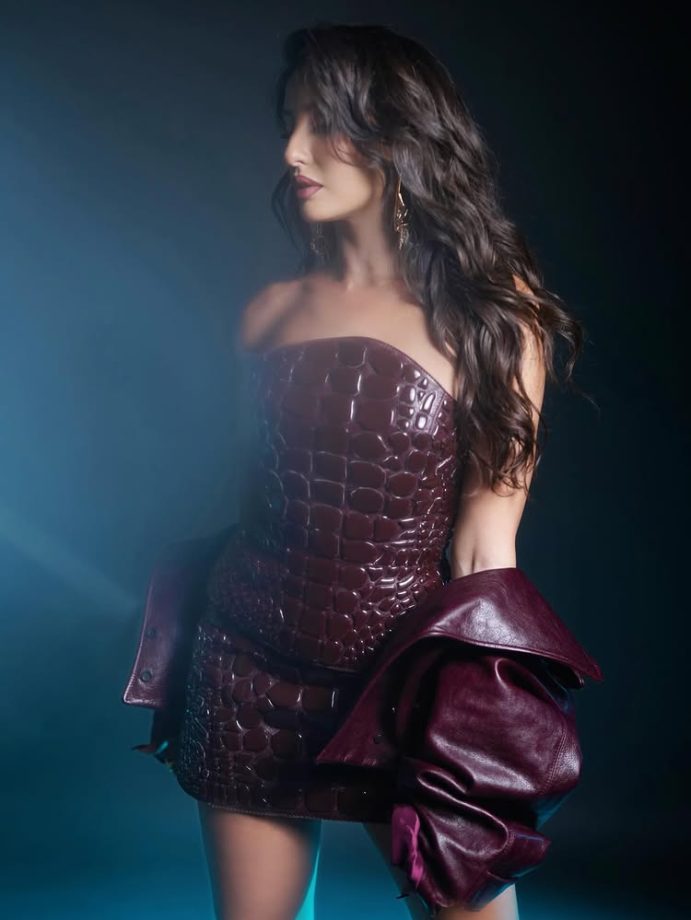 Nora Fatehi Makes a Bold Style Statement in a Deep Wine Mini Dress 984570