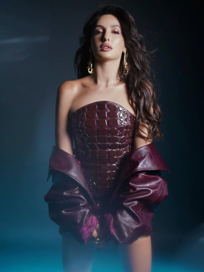 Nora Fatehi Makes a Bold Style Statement in a Deep Wine Mini Dress 984571