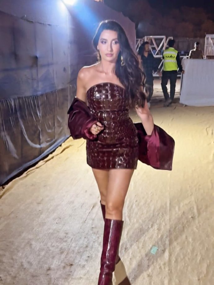 Nora Fatehi Makes a Bold Style Statement in a Deep Wine Mini Dress 984572