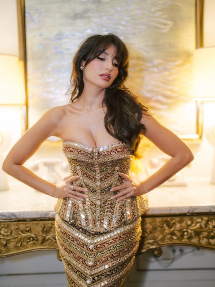 Nora Fatehi Shines in a Classic Gold Look That Speaks Style 982692