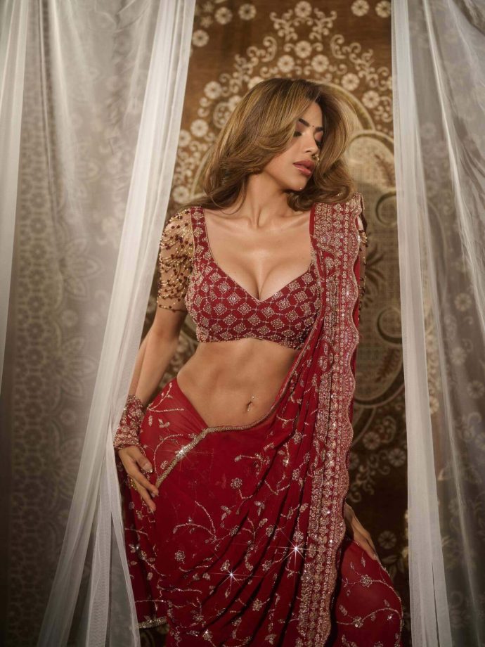 Nikki Tamboli Turns Heads in Bold Red Ethnic Look 989012