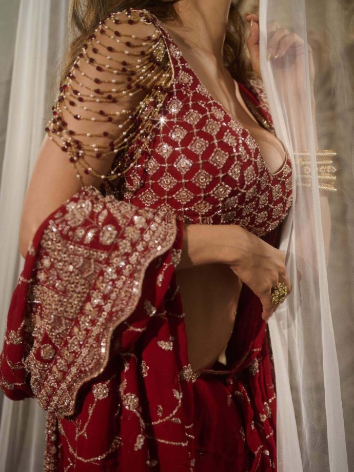 Nikki Tamboli Turns Heads in Bold Red Ethnic Look 989011