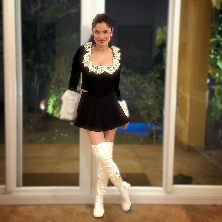 Ankita Lokhande Turns Heads in a Chic Black Mini Dress with Bold White Details 989940
