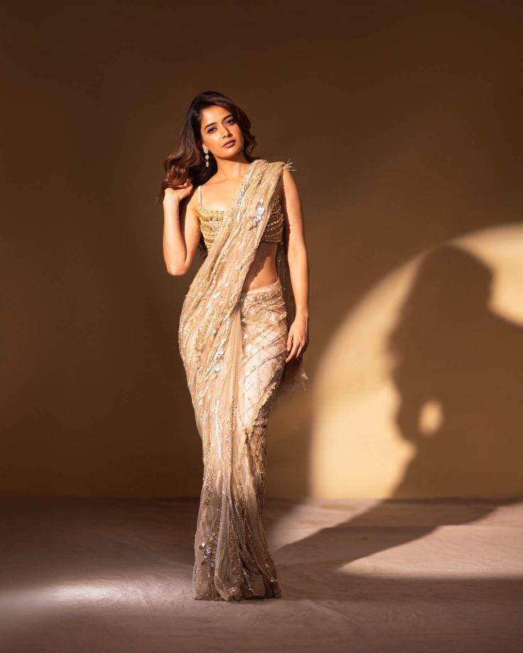 Ashika Ranganath Stuns in a Shimmering Gold Saree with Effortless Style 991955