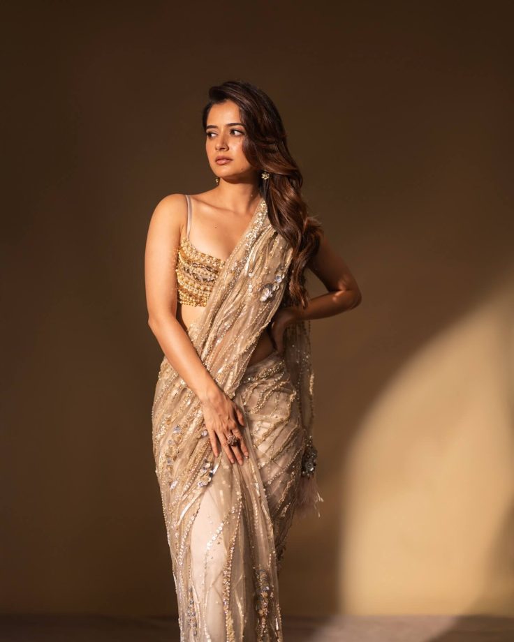 Ashika Ranganath Stuns in a Shimmering Gold Saree with Effortless Style 991957
