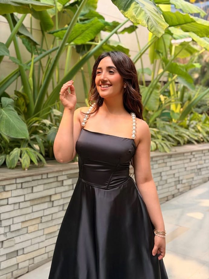 Ashnoor Kaur Stuns in a Chic Black Dress with Elegant Pearl Details 989804