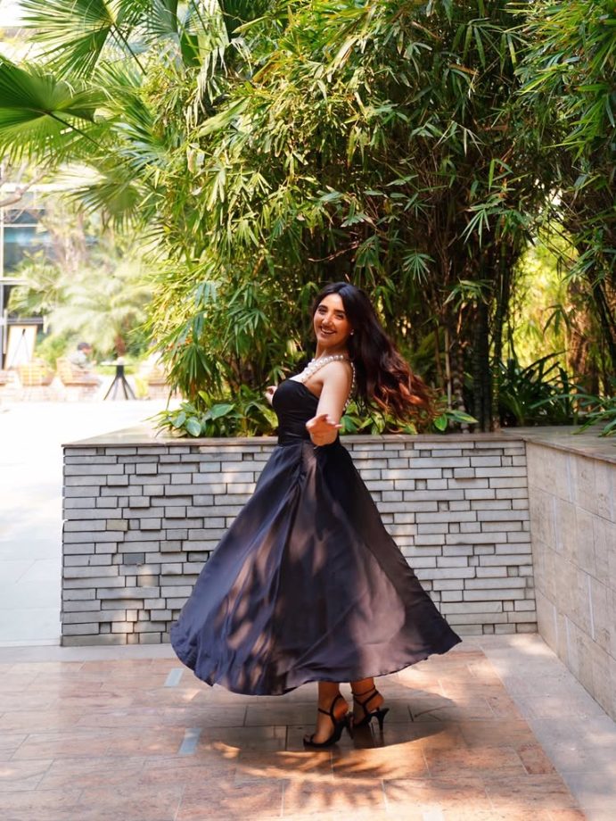 Ashnoor Kaur Stuns in a Chic Black Dress with Elegant Pearl Details 989807
