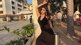 Mouni Roy Turns Heads In A Stunning Black Beach Dress During Her Stylish Day Out