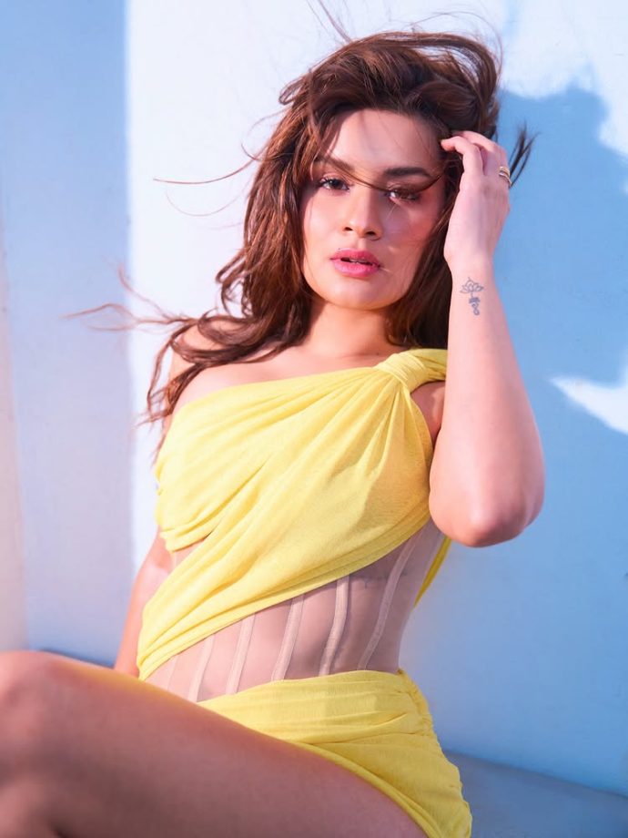 Avneet Kaur Turns Heads in a Bold Yellow Draped Dress, Serving High-Fashion Glam 989817