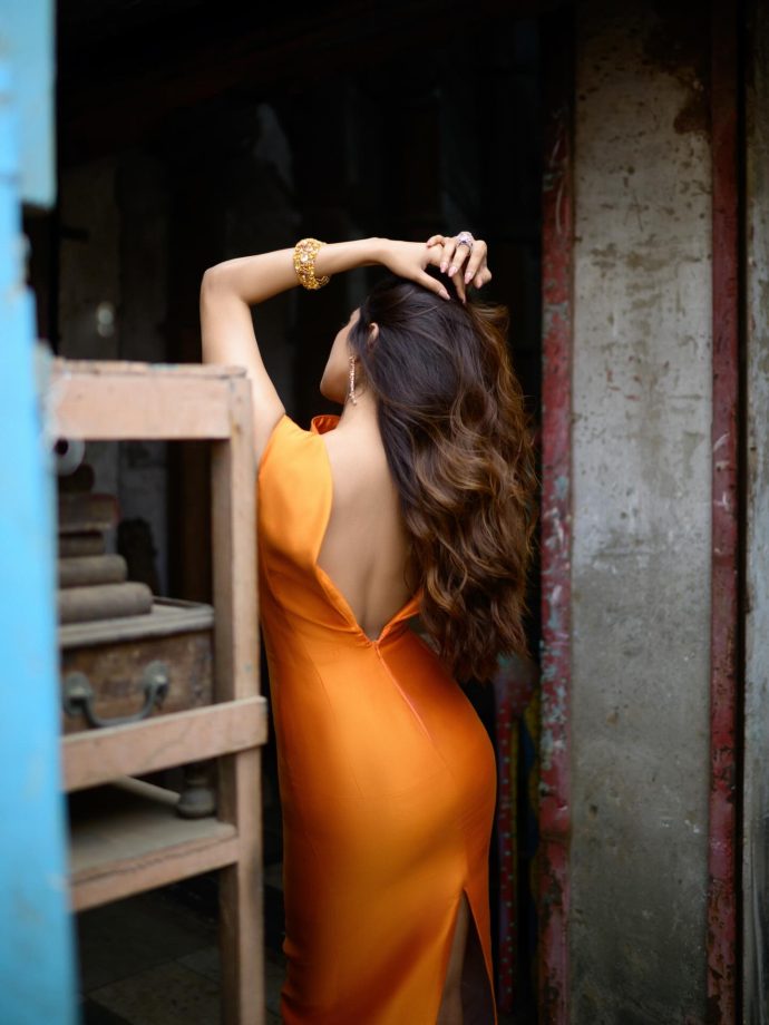Malavika Mohanan brings bold elegance in a bright orange look by Bibhu Mohapatra 990933