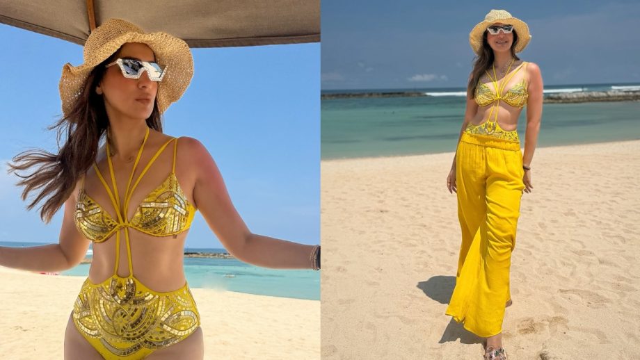 Raai Lakshmi Brings the Perfect Beach Glam in a Bold Yellow Swimsuit 991317