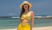 Raai Lakshmi Brings the Perfect Beach Glam in a Bold Yellow Swimsuit