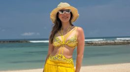Raai Lakshmi Brings the Perfect Beach Glam in a Bold Yellow Swimsuit