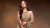 Sunny Leone Glows in Elegant Gold Saree Look with Statement Halter Blouse