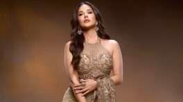 Sunny Leone Glows in Elegant Gold Saree Look with Statement Halter Blouse