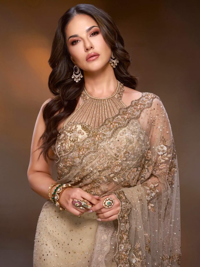 Sunny Leone Glows in Elegant Gold Saree Look with Statement Halter Blouse 991113