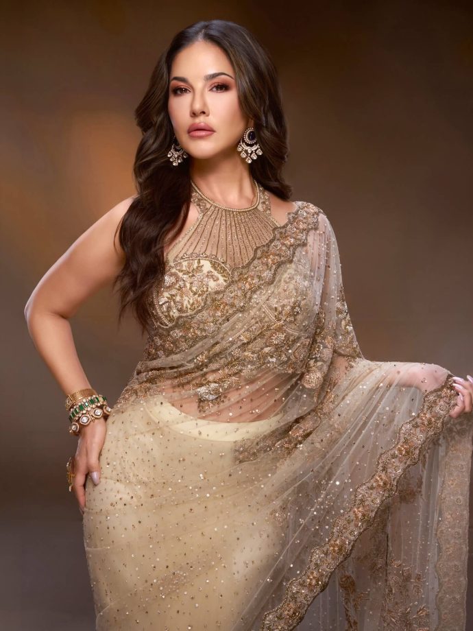 Sunny Leone Glows in Elegant Gold Saree Look with Statement Halter Blouse 991115