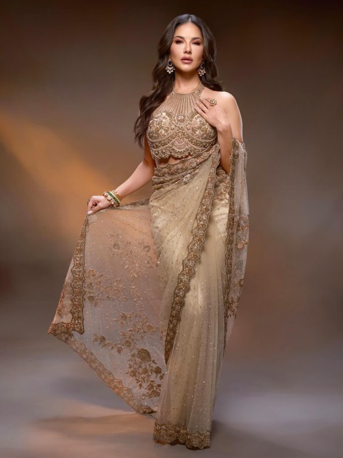 Sunny Leone Glows in Elegant Gold Saree Look with Statement Halter Blouse 991116