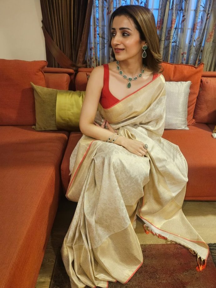 Trisha Krishnan Keeps It Graceful In Red Blouse And Golden Saree 989778