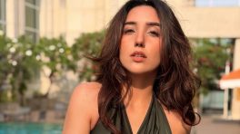 Ashnoor Kaur Brings Easy Glam in a Sleek Black Mini Dress by the Pool