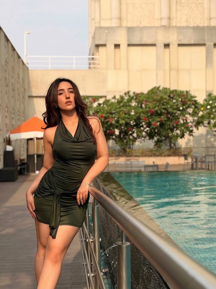 Ashnoor Kaur Brings Easy Glam in a Sleek Black Mini Dress by the Pool 994757