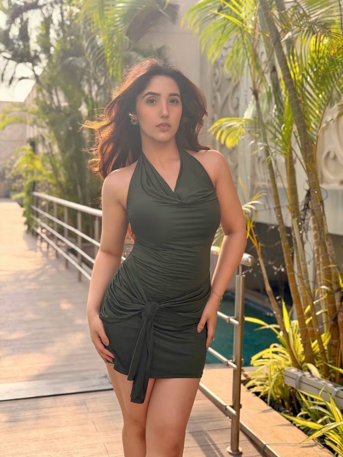 Ashnoor Kaur Brings Easy Glam in a Sleek Black Mini Dress by the Pool 994759