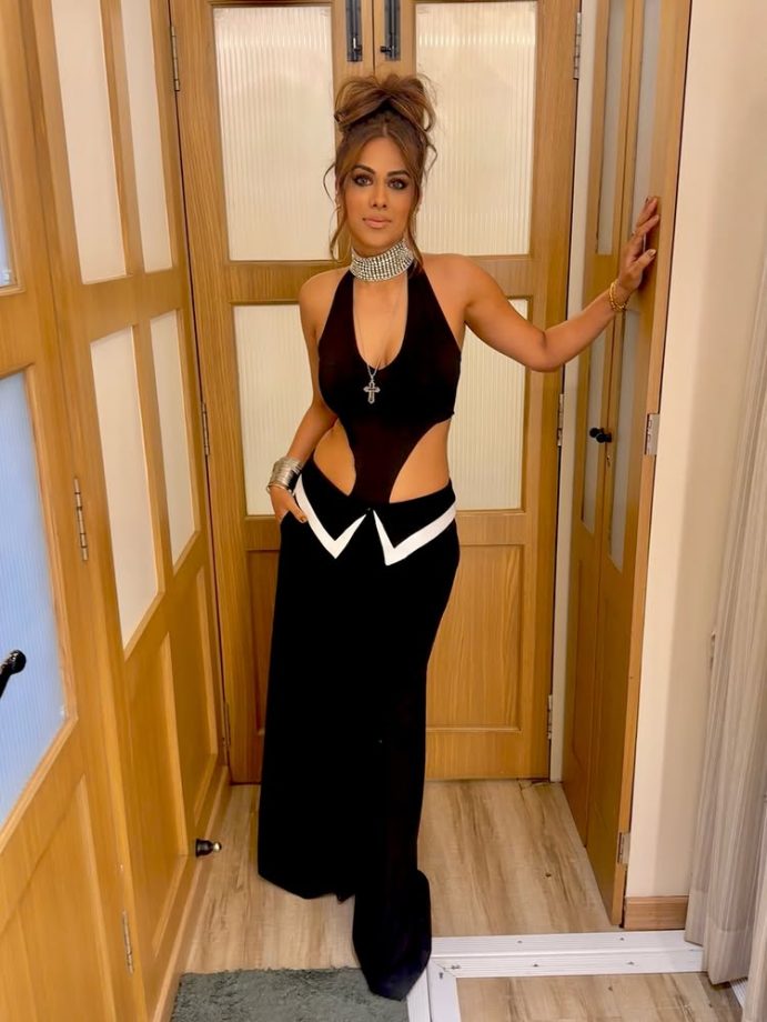 Nia Sharma owns the bold look in a fierce black cut-out outfit 994707