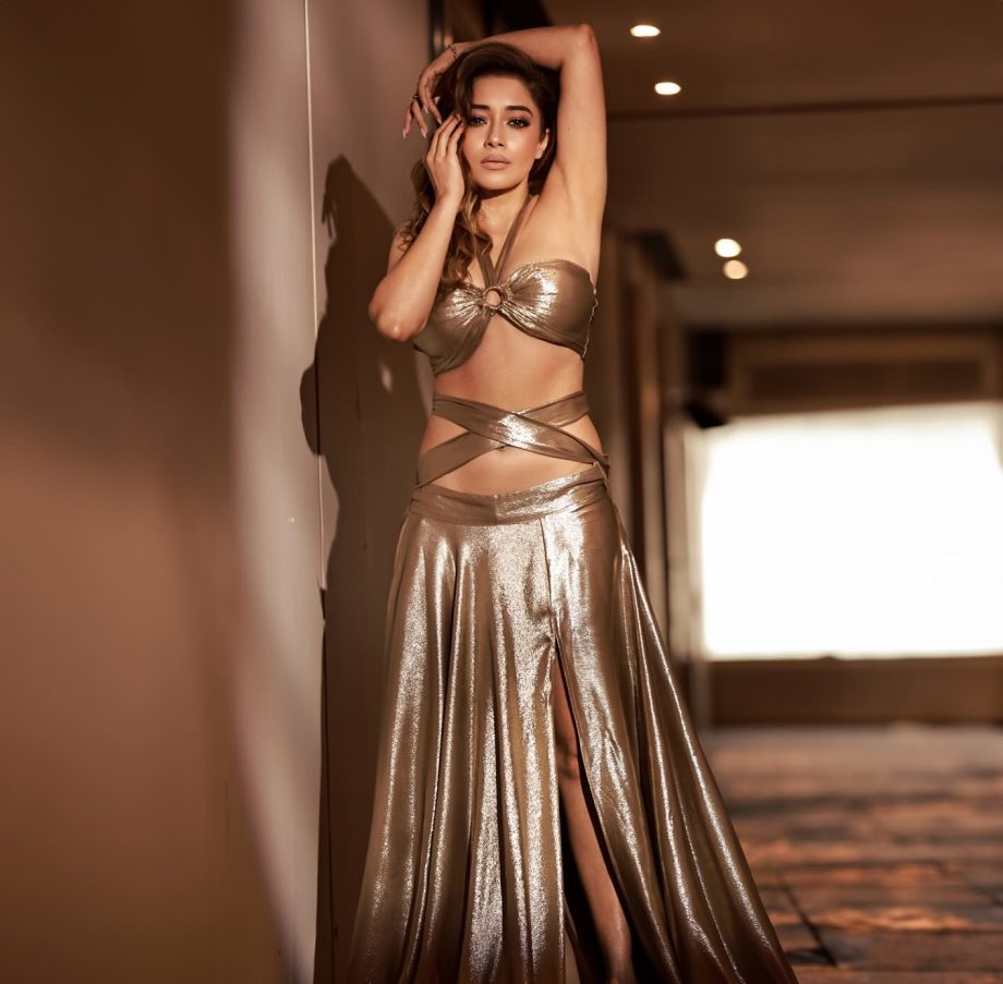 Tina Datta turns heads in a golden cut-out dress with a striking silhouette 995881