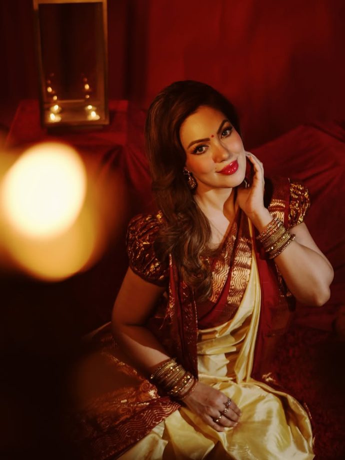 Munmun Dutta brings timeless elegance in a classic red and gold saree look 996082