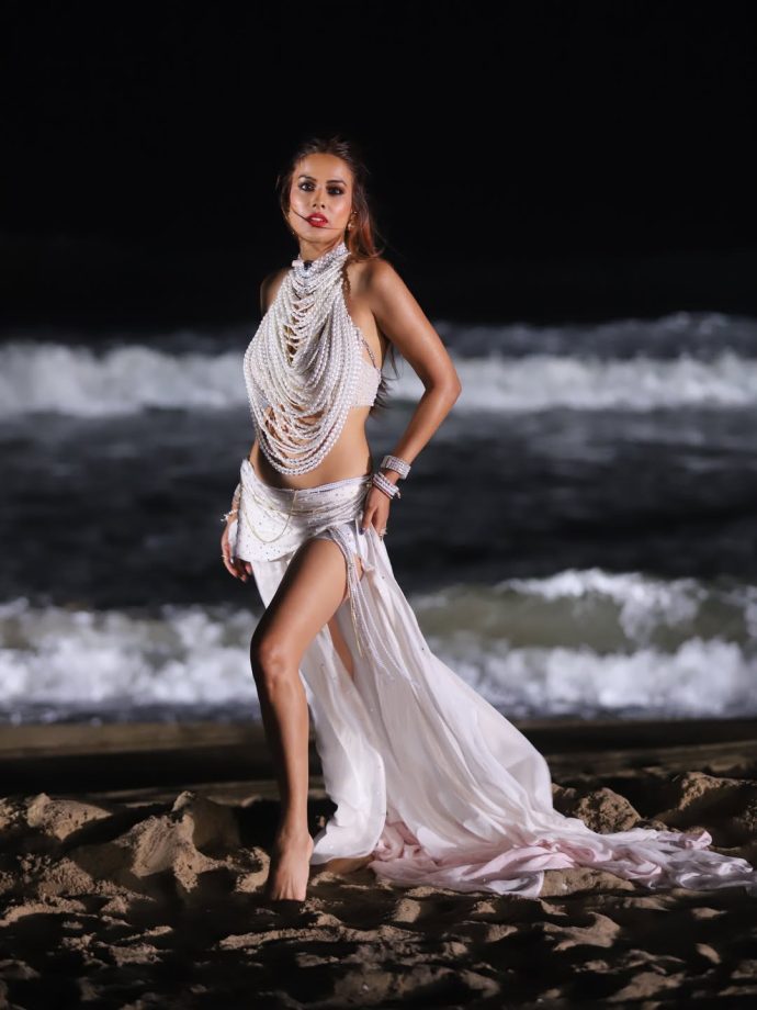 Nia Sharma Stuns In Pearl-Draped Beach Look During Glamorous Night Shoot 998218