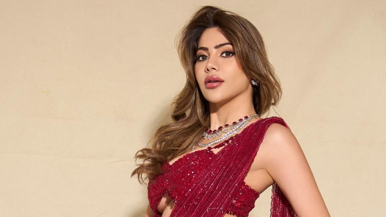 Nikki Tamboli Adds a Hint of “Untouchable” Glam in This Stunning Red Saree Look 998254