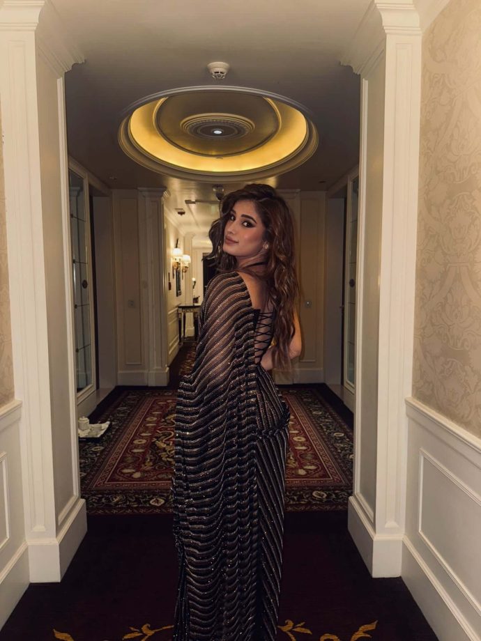 Rasha Thadani Keeps It Glam in a Black Shimmery Saree 996726