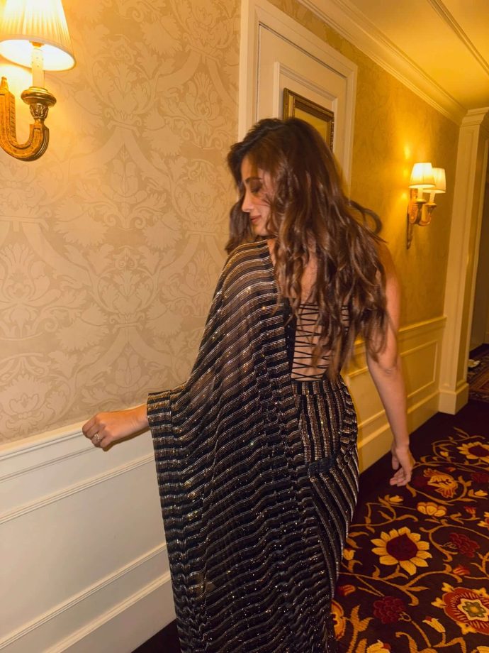 Rasha Thadani Keeps It Glam in a Black Shimmery Saree 996723